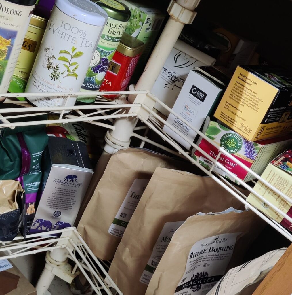 A cabinet full of various teas and coffees, which Halliday used as a habit replacement when quitting smoking years ago